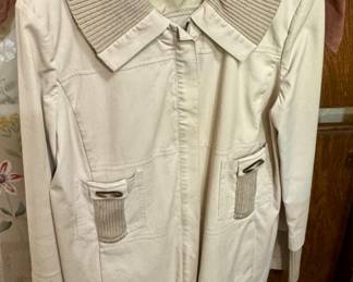 St. John Sport lightweight jacket with a ribbed knit collar, cuffs, and pocket trim