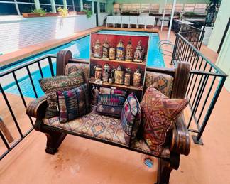 vintage wooden bench and a framed beer puzzle
