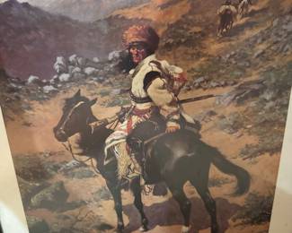Framed print of the 1889 oil painting titled "An Indian Trapper" by the celebrated American Western artist Frederic Remington
