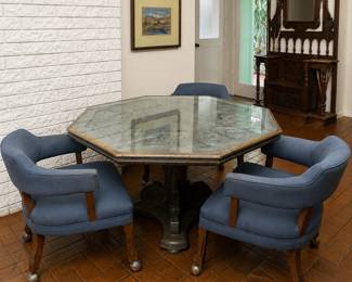 vintage octagonal game table set featuring an inlaid glass top Over carved wood