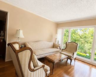 Formal living room with pair of wing back chairs and a lovely sofa