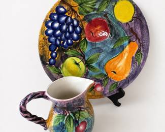 vintage hand-painted ceramic pitcher and decorative plate set with a colorful fruit motif made by Ancora in Italy