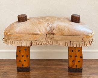 Love this rustic fringed stool