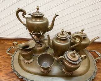 antique brass or copper tea and coffee service set on a matching ornate serving tray