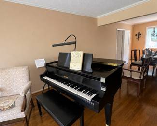 American-built Baldwin grand piano. Baldwins are highly regarded for their rich, robust tone.
