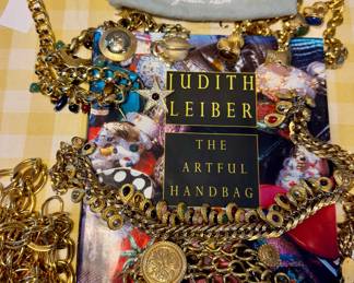 Not many people get a signed Judith Leiber book! Check out the vintage belts.