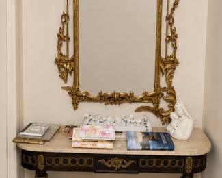 Chinese Chippendale Revival Carved Wall Mirror, vintage Louis XVI-style ebonized console table featuring an elegant shaped marble top and ornate gilt-bronze mounts