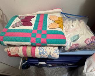 Loads of quilts and hand embroidered linens