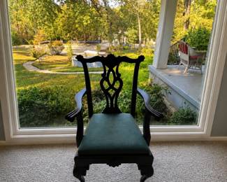 A single, beautiful Chippendale style chair. Look at the view to front lawn