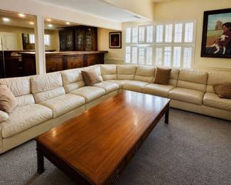 Largest coffee table you will ever find with ivory leather sectional