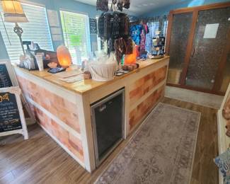 Desk custom with Himalayan salt , refrigerator, lamps, cash register shelving