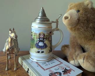 Vintage stein, books and an eclectic mix of collectibles for the young or young at heart.