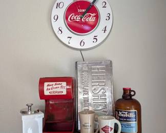 Vintage Coca-Cola advertising, bottles and soda fountain collectibles.
