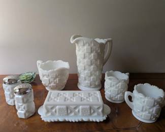Milk glass, pottery and vintage decorative pieces.