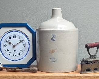 Large stoneware jug, vintage kitchen clock and other farmhouse finds.