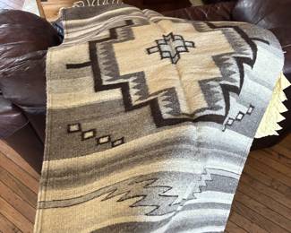 wool aztec or native american wall hanging or oculd be used as throw or rug. This was not used.