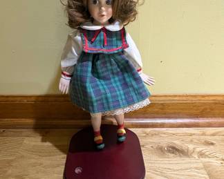 Porcelain Doll in Plaid Dress