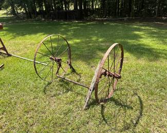 Antique iron farm-implement wheels