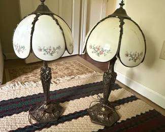Group of three decorative electric table lamps: matching pair plus one floral glass lamp