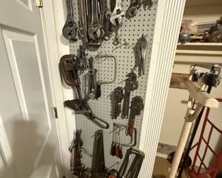 Pegboard-mounted assortment of hand tools - additional view