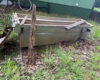 Diamond-plate metal storage box with rail/rack assembly