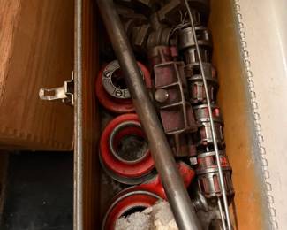 RIDGID pipe-threading tool lot in metal toolbox