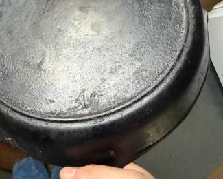 Large unmarked cast-iron skillet with heat ring - additional view