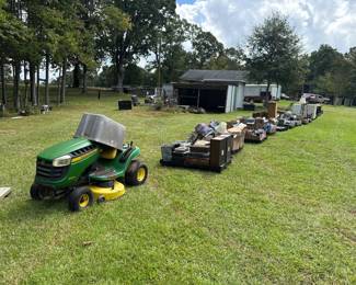 John Deere mower and organized auction rows
