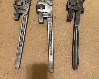 Large RIDGID and Stillson pipe wrenches