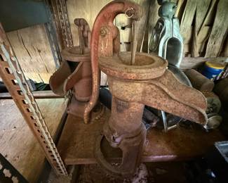 Two antique-style cast-iron hand water pumps - additional view