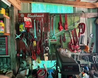 Blackhawk-branded shop display boards with assorted mechanic and plumbing hand tools