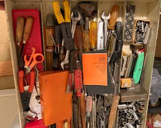 Two drawers of assorted hand tools, drill-bit indexes, sockets, and boring tools