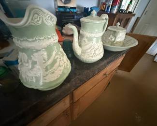 Handcrafted pale-green and white relief-decorated ceramic serving set, 4 pieces