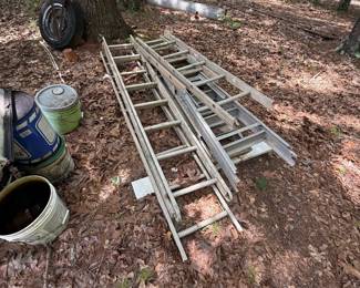 Outdoor-stored extension ladders and miscellaneous utility items