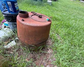 Unidentified cylindrical metal tank or reservoir with top access hatch