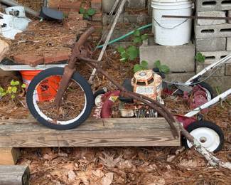 Rusty vintage child’s tricycle or pedal-cycle frame