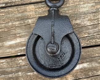 Vintage cast-iron pulley block