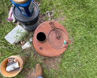 Unidentified cylindrical metal tank or reservoir with top access hatch - additional view