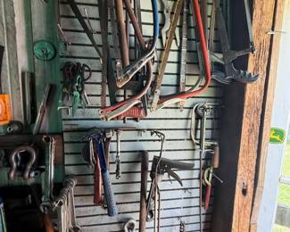 Mixed wall lot of vintage and utility hand tools