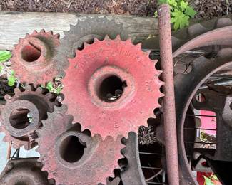 Lot of assorted antique agricultural-machine sprockets and cast-iron drive parts - additional view