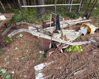 Group of weathered farm implements and mechanical screw jacks - additional view