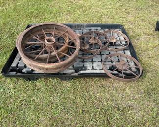 Vintage iron wheels and pulleys