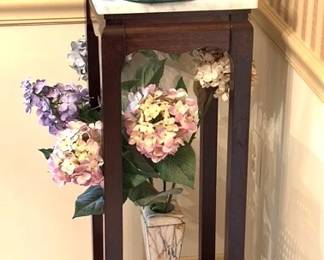 Marble top plant stand and other items.