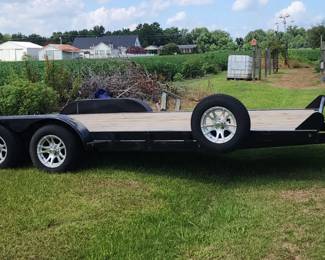 tandem axle equipment trailer 5 lug rims. Title in hand. Clean trailer.