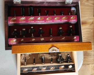 like new router bits in wooden cases