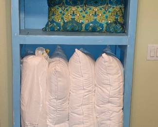 Bed pillows, throw pillows, and quilts