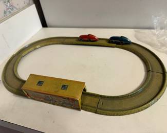 Vintage tin lithographed wind-up race car set, (Technofix 245 Autobahn or similar mid-20th-century clockwork toy sets from makers like Technofix or the Automatic Toy Co.)