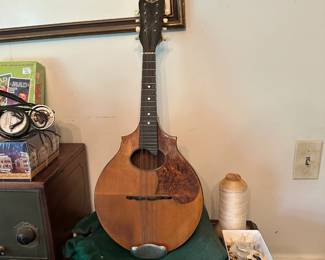 Antique A-style or oval-hole flatback/bowlback acoustic mandolin