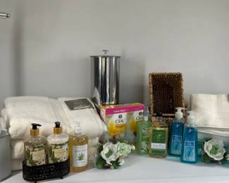 Bathroom Accessories With Bath Towels, Hand Soaps, Olay Bar Soap and Storage Basket