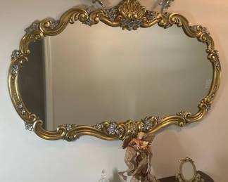 Ornate Gold Tone Wall Mirror with Cherub Figures and Floral Embellishments
